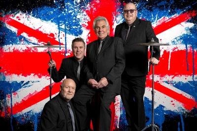 Herman's Hermits group onfront of Union Jack Flag